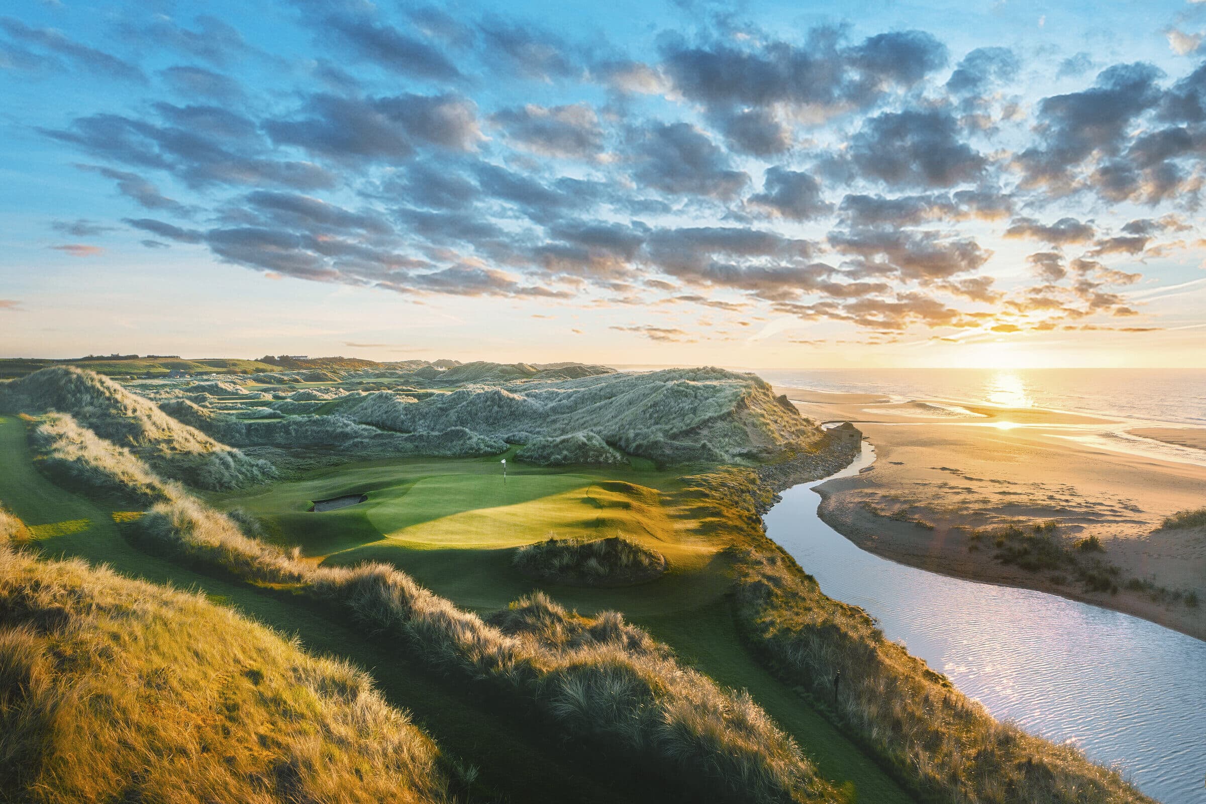 Golden-hour par-3 with the burn running to the sea, Trump International Golf Links Aberdeen