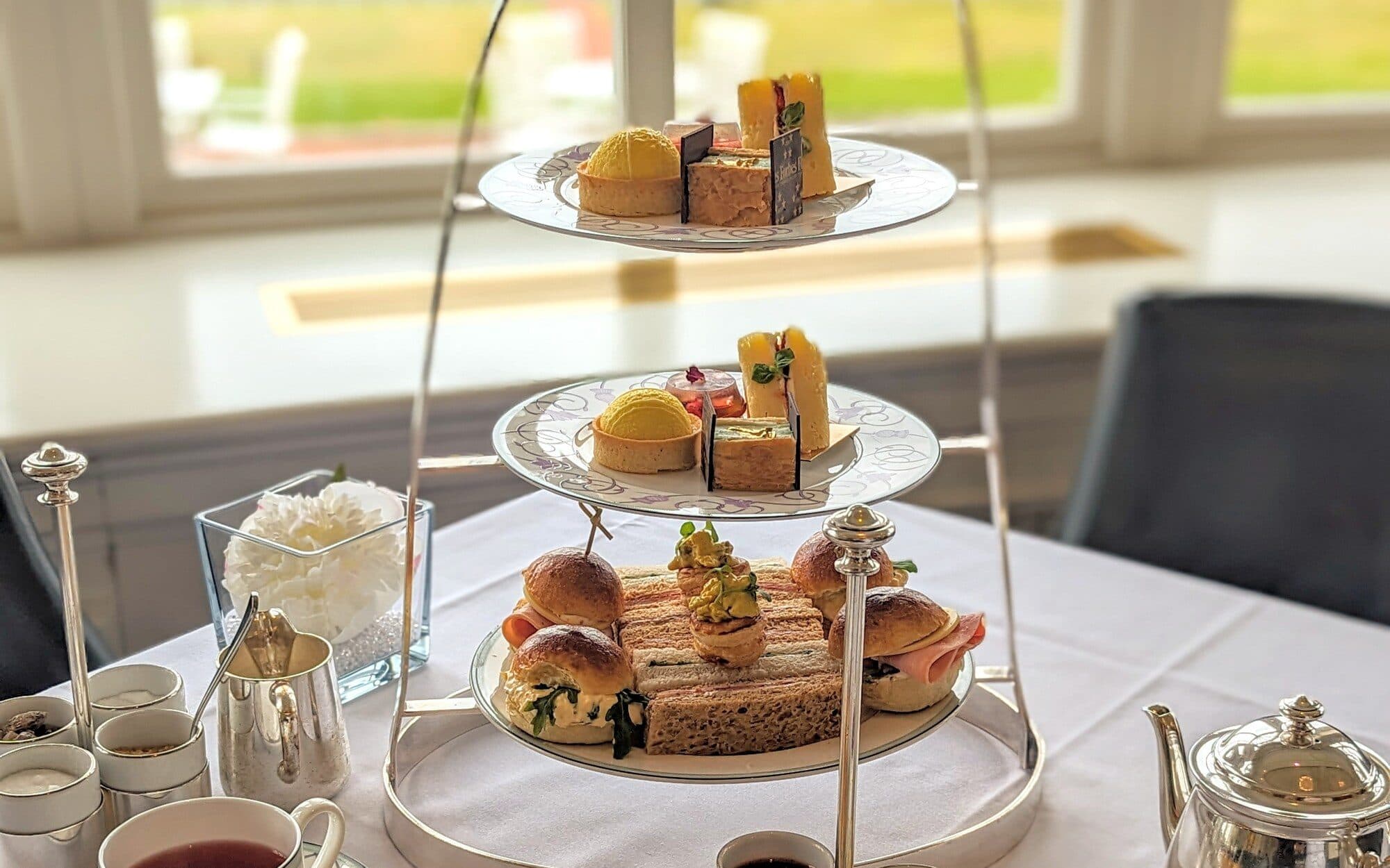 Afternoon tea at Trump Turnberry — tiered stand, the links beyond