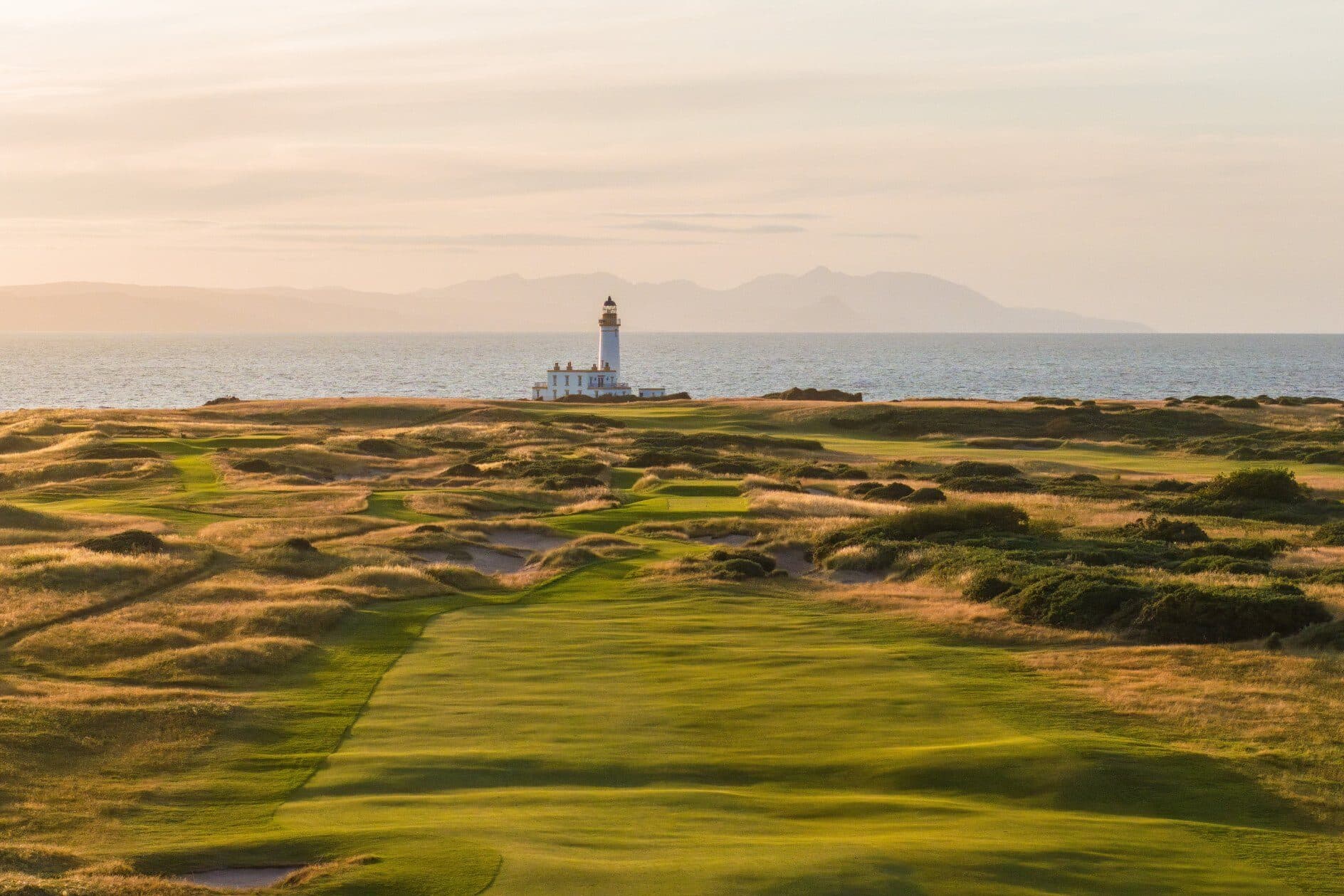 Trump Turnberry — the Ailsa course at golden hour, running to the lighthouse