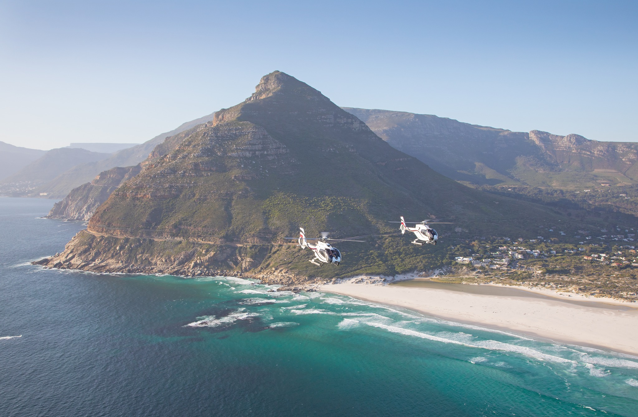 Helicopters flying over Cape Point and the coastline